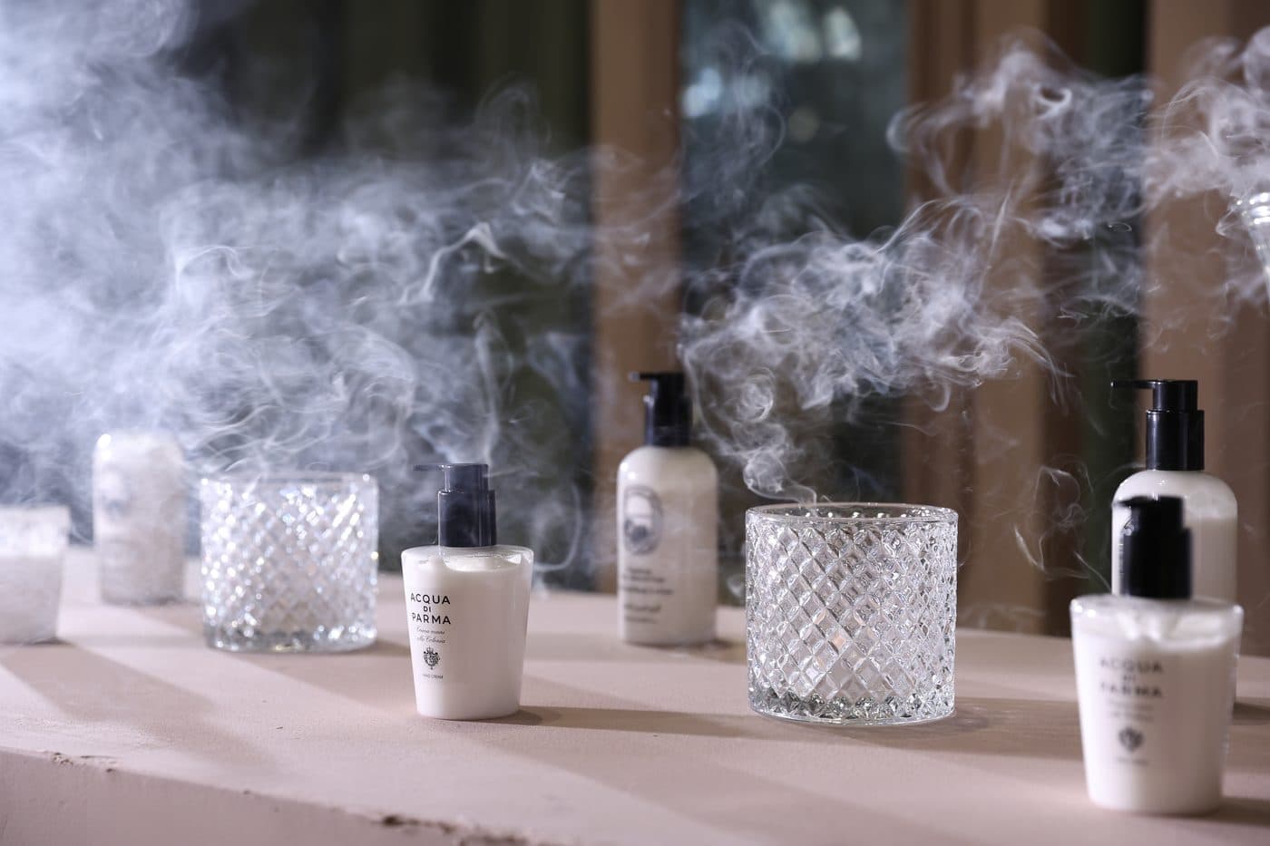 Bakhoor smoke drifting across the perfume table