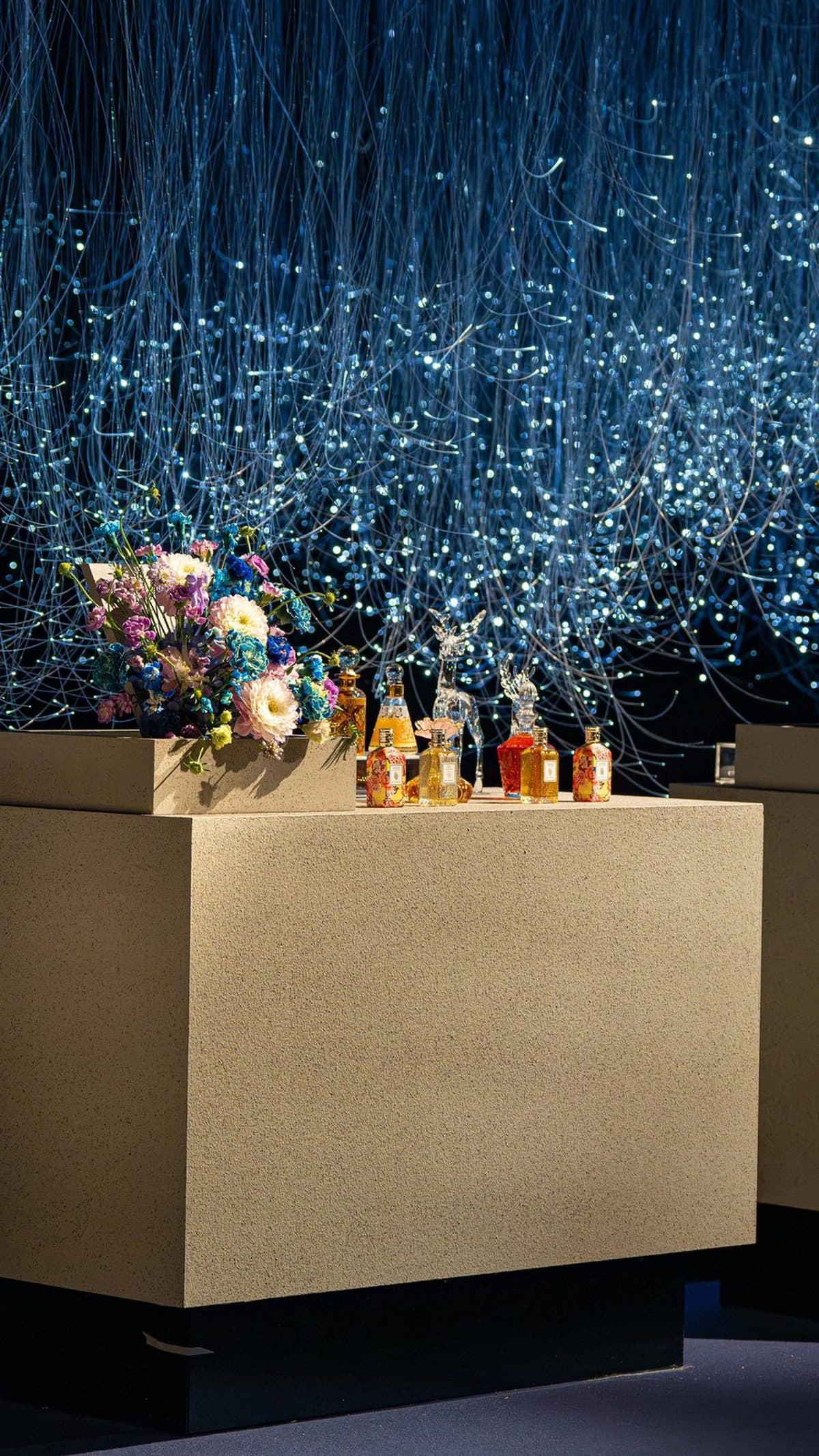 Lega perfume table under a starlight installation at an Emirati wedding